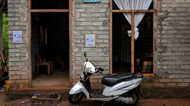 A bike stands outside the unfinished house of Lahiru Prasanga Fernando, 34, and his wife Diliini Sangeewani, 34,who were killed during Easter Sunday bombings at St. Sebastian Church. “They had been married for more than 15 years and were so happy together. They were childless but treated this house as their kid. They were building it slowly for the last few years. Now they’ve left me alone in this house,” said Sudarshni Fernando, mother of Lahiru. (Danish Siddiqui / REUTERS) A bike stands outside the unfinished house of Lahiru Prasanga Fernando, 34, and his wife Diliini Sangeewani, 34,who were killed during Easter Sunday bombings at St. Sebastian Church. “They had been married for more than 15 years and were so happy together. They were childless but treated this house as their kid. They were building it slowly for the last few years. Now they’ve left me alone in this house,” said Sudarshni Fernando, mother of Lahiru. (Danish Siddiqui / REUTERS)