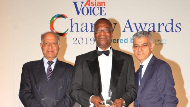 CB Patel, publisher-editor of ‘Asian Voice’ (left) and London mayor Sadiq Khan (right) presenting the Editor’s Choice Award to the Damilola Taylor Trust.(HT PHOTO) CB Patel, publisher-editor of ‘Asian Voice’ (left) and London mayor Sadiq Khan (right) presenting the Editor’s Choice Award to the Damilola Taylor Trust.(HT PHOTO)