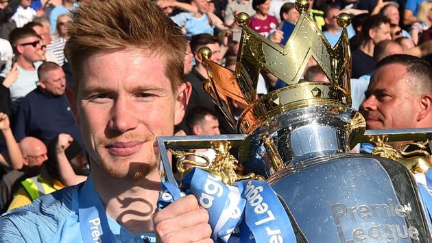 Manchester City's Belgian midfielder Kevin De Bruyne poses with the Premier League trophy. (AFP) Manchester City's Belgian midfielder Kevin De Bruyne poses with the Premier League trophy. (AFP)