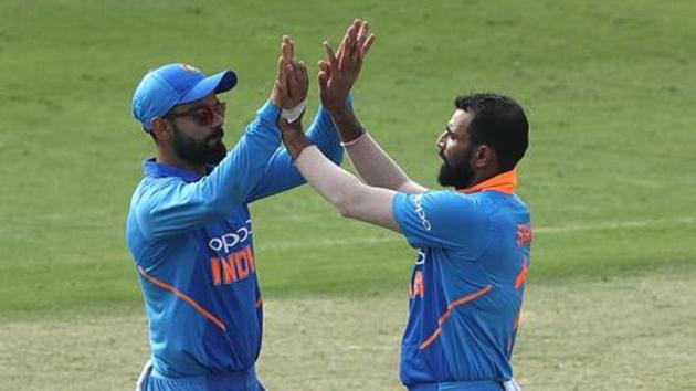 File image of India pacer Mohammed Shami celebrating with skipper Virat Kohli. (Getty Images) File image of India pacer Mohammed Shami celebrating with skipper Virat Kohli. (Getty Images)