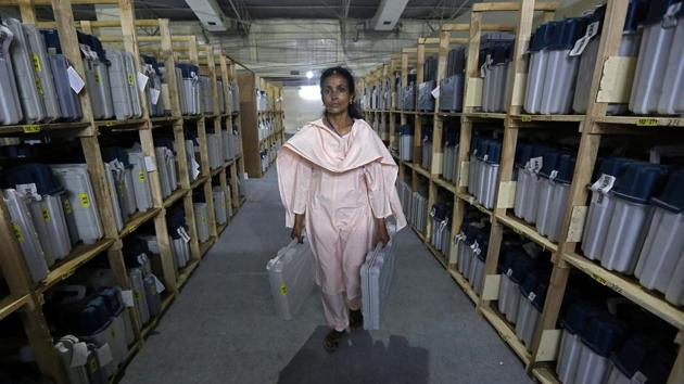 An election staff member carries Electronic Voting Machines (EVM) after collecting them from a distribution centre at an indoor stadium ahead of the seventh and last phase of general election, in Kolkata, West Bengal. (Rupak De Chowdhuri / REUTERS) An election staff member carries Electronic Voting Machines (EVM) after collecting them from a distribution centre at an indoor stadium ahead of the seventh and last phase of general election, in Kolkata, West Bengal. (Rupak De Chowdhuri / REUTERS)