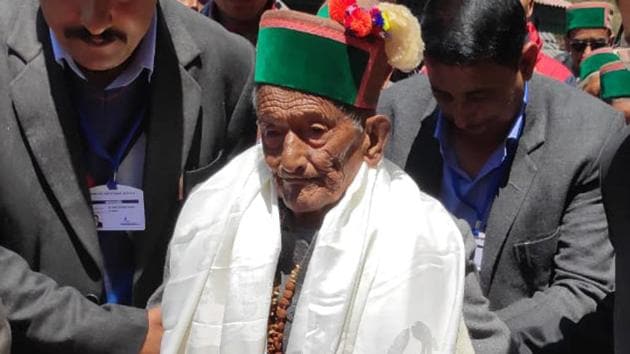 102-year-old Shyam Saran Negi from Kalpa arrives to casts his vote. (ANI) 102-year-old Shyam Saran Negi from Kalpa arrives to casts his vote. (ANI)