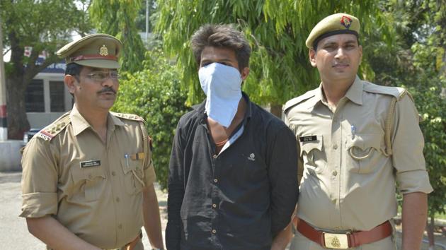 Kapil Panchal, part of the ‘Ashu gang’, involved in stealing a Duster SUV, after his arrest in Ghaziabad on Saturday. (Sakib Ali / HT Photo) Kapil Panchal, part of the ‘Ashu gang’, involved in stealing a Duster SUV, after his arrest in Ghaziabad on Saturday. (Sakib Ali / HT Photo)