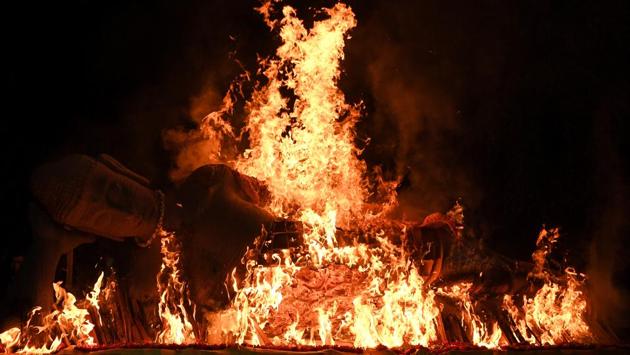 A Buddha statue is seen burning on Vesak Day in Mojokerto, East Java province. (Andreas Fitri Atmoko / Indonesia Out / REUTERS) A Buddha statue is seen burning on Vesak Day in Mojokerto, East Java province. (Andreas Fitri Atmoko / Indonesia Out / REUTERS)