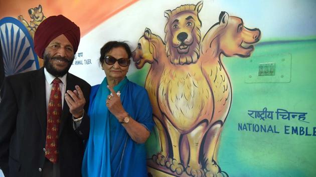Milkha Singh along with his wife Nirmal Kaur show their fingers marked with indelible ink after casting their vote during the seventh phase of Lok Sabha elections, at Sector 9, in Chandigarh. (Sanjeev Sharma / HT Photo) Milkha Singh along with his wife Nirmal Kaur show their fingers marked with indelible ink after casting their vote during the seventh phase of Lok Sabha elections, at Sector 9, in Chandigarh. (Sanjeev Sharma / HT Photo)