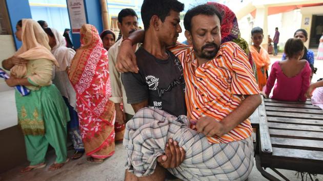 A person carries his specially abled father from a polling booth during the seventh and last phase of Lok Sabha elections, at Diamond Harbour constituency, in Kolkata, West Bengal. (Arijit Sen / HT Photo) A person carries his specially abled father from a polling booth during the seventh and last phase of Lok Sabha elections, at Diamond Harbour constituency, in Kolkata, West Bengal. (Arijit Sen / HT Photo)