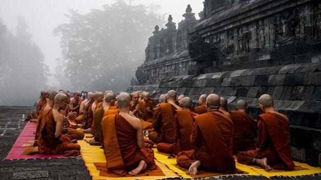 Buddhist monks pray on the eve of Buddha's birthday, at Borobudur temple. (Oa Hamied / AFP) Buddhist monks pray on the eve of Buddha's birthday, at Borobudur temple. (Oa Hamied / AFP)