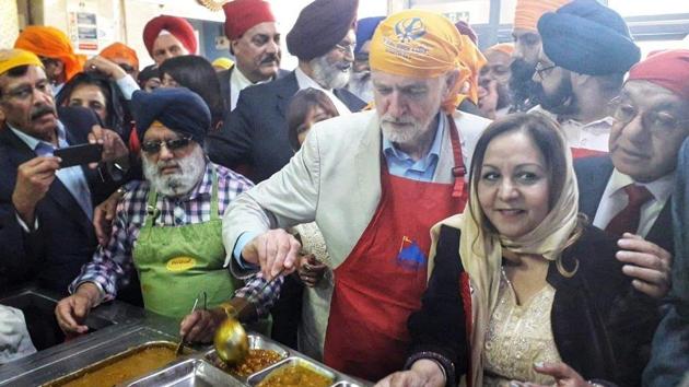 Labour leader Jeremy Corbyn serving during ‘langar’ at the Sri Guru Singh Sabha gurdwara in Southall on Sunday: Labour leader Jeremy Corbyn serving during ‘langar’ at the Sri Guru Singh Sabha gurdwara in Southall on Sunday: