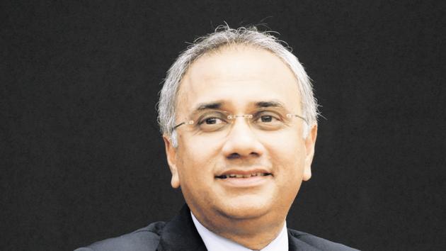 Salil Parekh, the chief executive officer of Infosys, took home a pay package of <span class='webrupee'>?</span>24.67 crore in the last financial year.(Mint /File Photo)