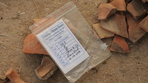 Archaeological details of the pottery excavated from the site. The fresh round of excavations has unearthed myriad cultural material, on the basis of which new conclusions can be drawn. Banani Bhattacharyya, deputy director of the Department of Archaeology and Museums, and co-director of the excavation, said pottery sourced from Kunal is evidence of the craftsmanship of the people of the settlement. (Parveen Kumar / HT Photo) Archaeological details of the pottery excavated from the site. The fresh round of excavations has unearthed myriad cultural material, on the basis of which new conclusions can be drawn. Banani Bhattacharyya, deputy director of the Department of Archaeology and Museums, and co-director of the excavation, said pottery sourced from Kunal is evidence of the craftsmanship of the people of the settlement. (Parveen Kumar / HT Photo)