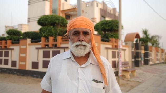 Not everyone in the village, however, seem to be happy with the presence of the historic site. Sukhwinder Singh, 45, is a relative of the original owners of the site and said his family had been cheated by the government. He claims that his uncle and his brothers owned the 5.5 acres land and opposed the initial excavations. The government promised them jobs, but gave them a compensation of Rs 22 lakhs for one acre. (Parveen Kumar / HT Photo) Not everyone in the village, however, seem to be happy with the presence of the historic site. Sukhwinder Singh, 45, is a relative of the original owners of the site and said his family had been cheated by the government. He claims that his uncle and his brothers owned the 5.5 acres land and opposed the initial excavations. The government promised them jobs, but gave them a compensation of Rs 22 lakhs for one acre. (Parveen Kumar / HT Photo)