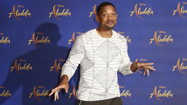 Actor Will Smith poses for photographers at the photo call for the film Aladdin in London.(Joel C Ryan/Invision/AP)