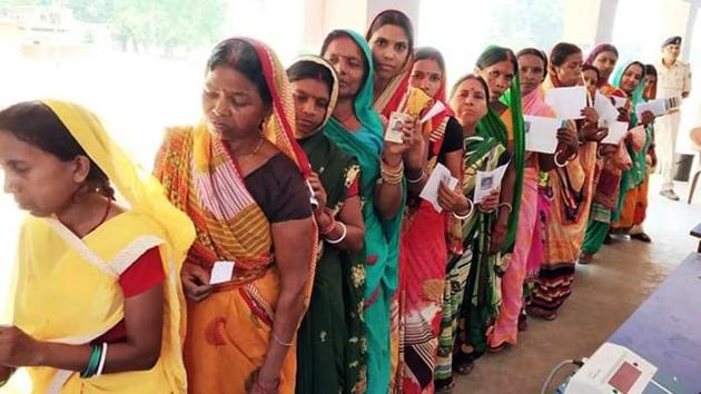 Women voters waiting in queue for their turn to cast their vote in a polling booth in Dumka during the last phase phase of Lok Sabha elections, Sunday, May 19, 2019. Counting of votes will take place on May 23.(ANI)