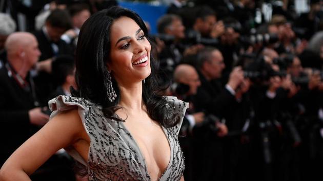 Mallika Sherawat poses as she arrives for the screening of the film La Belle Epoque at the 72nd edition of the Cannes Film Festival in Cannes, southern France on May 20, 2019.(AFP)
