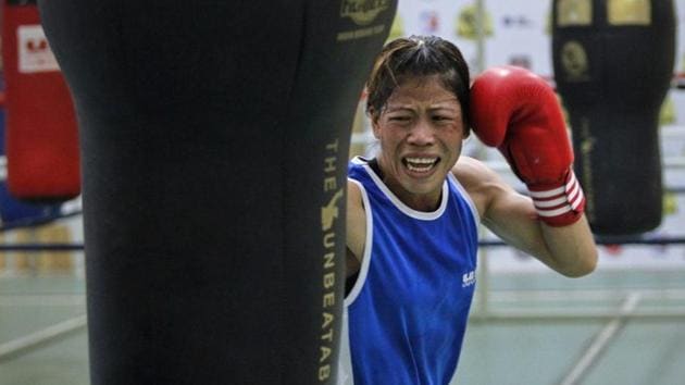 India's boxer MC Mary Kom punches a bag during a training session at Balewadi Stadium in Pune.(REUTERS)