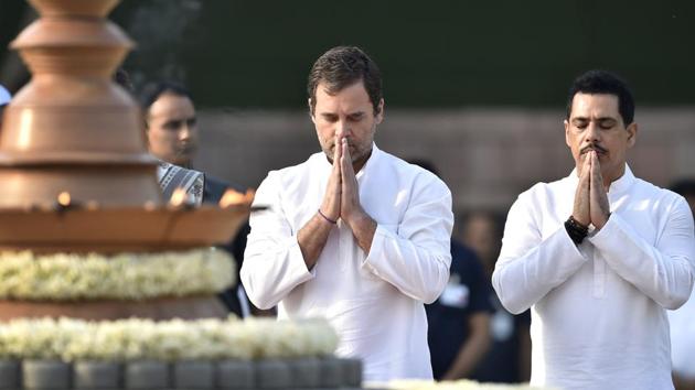 Congress President Rahul Gandhi and Robert Vadra pay tribute to late Prime Minister Rajiv Gandhi on his 28th death anniversary at Veer Bhoomi in New Delhi. Sonia Gandhi, Priyanka Gandhi and other members of the Congress party also paid their tributes. (Ajay Aggarwal / HT Photo) 