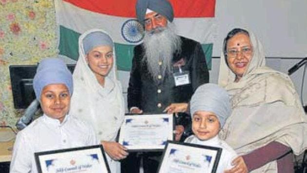 India’s high commissioner to the UK Ruchi Ghanshyam (R) and president of Sikh Council, Wales, Gurmit Randhawa honouring children for reciting ‘shabads’ at an event in Cardiff.