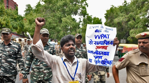 Parties asked workers to remain alert and check any vehicle or person entering or leaving the premises where the EVMs are being stored. (Burhaan Kinu/HT Photo)