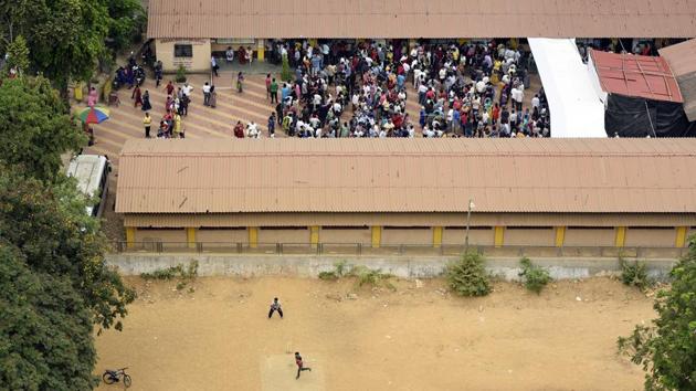 In Mumbai’s Goregaon, while people waited in queues to cast their votes during the fourth phase of Lok Sabha elections, children were seen playing cricket in the field right beside the polling booth. Elections or no elections – there’s always time for cricket in the world’s largest democracy. (Pramod Thakur / HT Photo) In Mumbai’s Goregaon, while people waited in queues to cast their votes during the fourth phase of Lok Sabha elections, children were seen playing cricket in the field right beside the polling booth. Elections or no elections – there’s always time for cricket in the world’s largest democracy. (Pramod Thakur / HT Photo)
