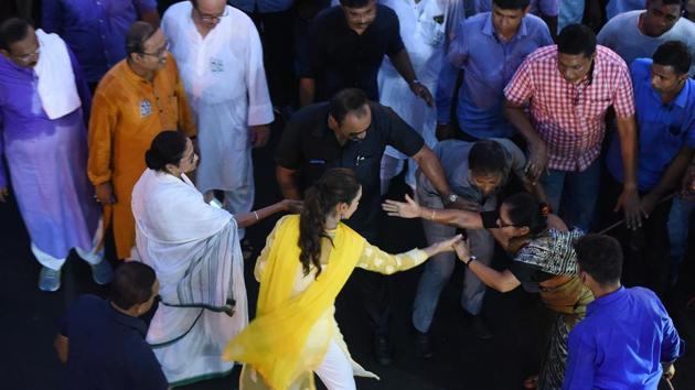West Bengal Chief Minister Mamata Banerjee vehemently opposed the Bharatiya Janata Party (BJP) during her election campaign. After clashes between TMC and BJP workers during BJP President Amit Shah’s road show, a bust of Ishwar Chandra Vidyasagar was vandalised in Kolkata. In this charged environment, Banerjee led took her campaign to the city’s roads, during which a supporter attempted to greet ‘Didi’. (Arijit Sen / HT Photo) 