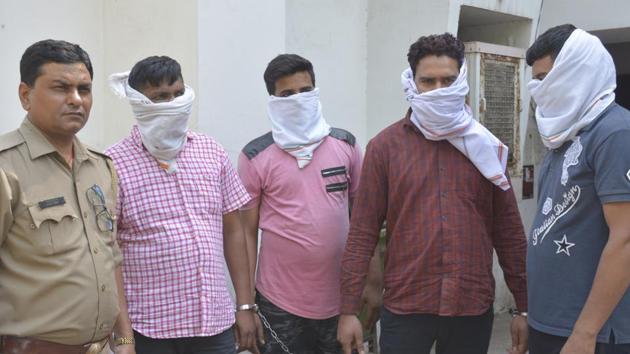 The arrested men were identified as Sanjeet Kumar, Baldev Singh, Tapeshwar Chaudhary and Gajendra.(Sakib Ali / HT Photo)