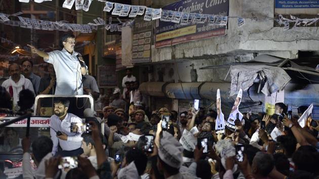 In Delhi, the Aam Aadmi Party (AAP) led by Delhi Chief Minister Arvind Kejriwal, conducted several road shows in support of their candidates. While Kejriwal is seen here supporting the AAP North East Delhi candidate Dilip Pandey at Sonia Vihar, at another rally in Moti Nagar, a disgruntled man breached the CM’s security and slapped him.  (Sanchit Khanna / HT Photo) 