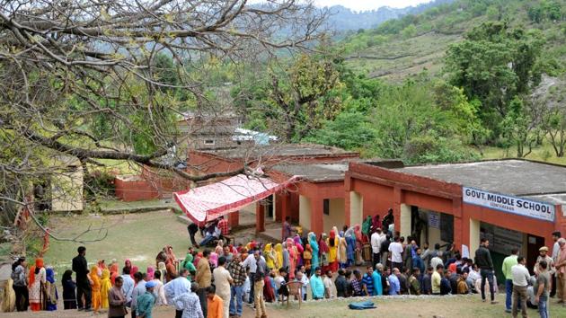 During the second phase of the polls on May 18, people queued to cast their votes at a government school at Udhampur, about 75 km from Jammu. Jammu and Kashmir contributes to 6 seats in the 543-membered Lok Sabha but saw polling the process of re-polling drag across several phases due to either security concerns or low voter participation. (Nitin Kanotra / HT Photo) During the second phase of the polls on May 18, people queued to cast their votes at a government school at Udhampur, about 75 km from Jammu. Jammu and Kashmir contributes to 6 seats in the 543-membered Lok Sabha but saw polling the process of re-polling drag across several phases due to either security concerns or low voter participation. (Nitin Kanotra / HT Photo)