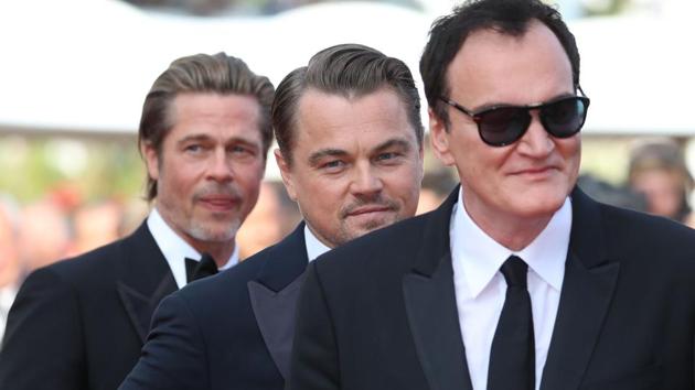 Quentin Tarantino, Leonardo DiCaprio and Brad Pitt arrive for the screening of the film Once Upon a Time... in Hollywood.(AFP)