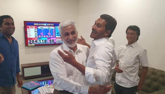 YSR Congress party chief YS Jagan Mohan Reddy being congratulated after the win in assembly polls on Thursday.(Facebook)