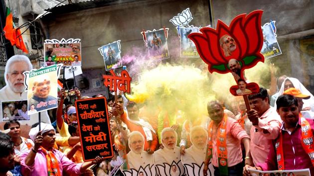 The BJP is set to storm the Lok Sabha, with election commission figures showing the party leading in over 300 seats.(Rajesh Kumar / Hindustan Times)