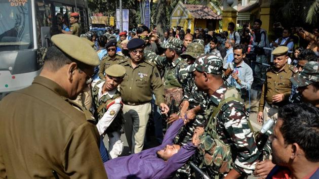 Police personnel detain members of Left Democratic Front (LDF) during a protest against Citizenship (Amendment) Bill, in Guwahati in February 2019.(PTI FILE PHOTO)