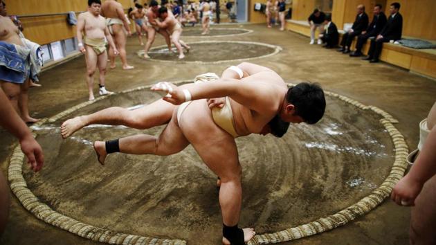 College students work out at the Sumo wrestling club at Nippon Sports Science University in Tokyo, Japan. (Issei Kato / REUTERS)