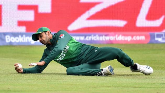 Pakistan's Shoaib Malik dives to make a catch and take the wicket of Afghanistan's Hazratullah Zazai for 49 runs. (AFP) Pakistan's Shoaib Malik dives to make a catch and take the wicket of Afghanistan's Hazratullah Zazai for 49 runs. (AFP)