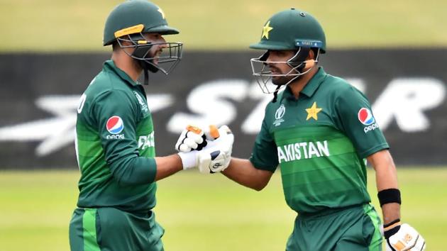 Pakistan's Babar Azam (R) celebrates his century with Pakistan's Imad Wasim. (AFP) Pakistan's Babar Azam (R) celebrates his century with Pakistan's Imad Wasim. (AFP)