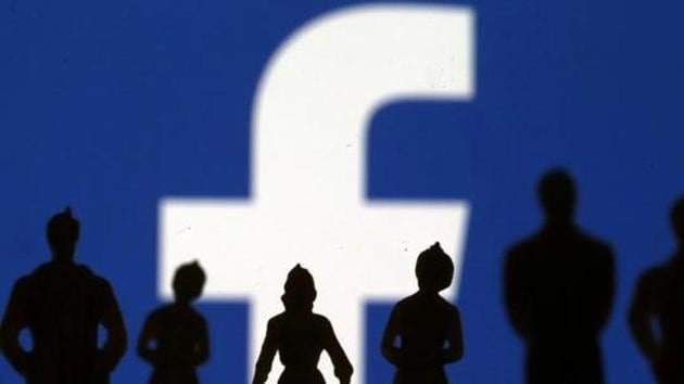 FILE PHOTO: Small toy figures are seen in front of Facebook logo in this illustration picture, April 8, 2019. REUTERS/Dado Ruvic/File Photo(REUTERS)
