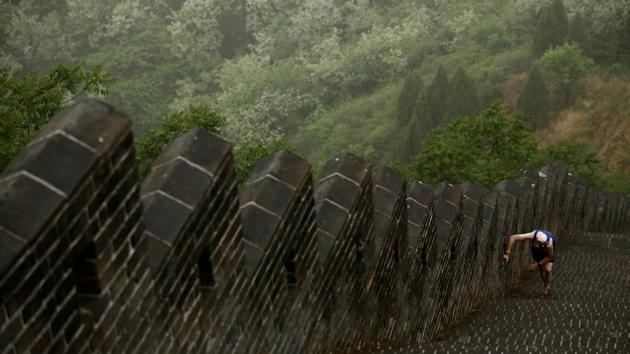 A runner competes in the Great Wall Marathon at the Huangyaguan Great Wall outside Beijing, China. (Thomas Peter / REUTERS)