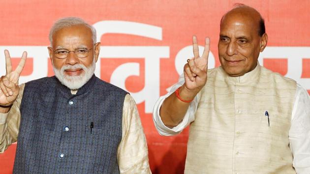 Union home minister Rajnath Singh with Prime Minister Narendra Modi after the election results in New Delhi, India, May 23, 2019.(Reuters)