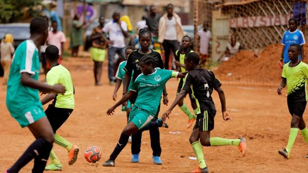 Gaelle Asheri (C), during a friendly match. Both girls initially faced opposition but neither was deterred. “I’ve seen Gaelle (Enganamouit) play on TV. I’ve never missed one of her matches. She plays so well, I want to be like her,” Pouadjeu said. “I picked up the ball, I kicked it and I never looked back,” Asheri said, recalling the childhood street soccer games with her male cousins and neighbours. (Zohra Bensemra / REUTERS) Gaelle Asheri (C), during a friendly match. Both girls initially faced opposition but neither was deterred. “I’ve seen Gaelle (Enganamouit) play on TV. I’ve never missed one of her matches. She plays so well, I want to be like her,” Pouadjeu said. “I picked up the ball, I kicked it and I never looked back,” Asheri said, recalling the childhood street soccer games with her male cousins and neighbours. (Zohra Bensemra / REUTERS)