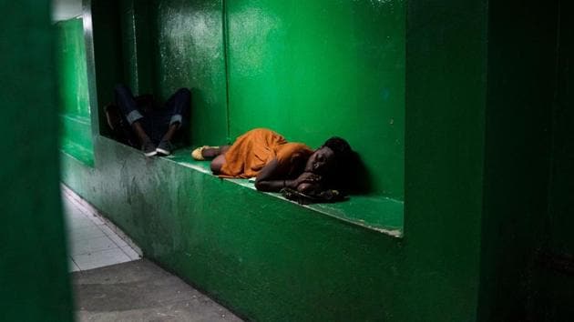 Family members of the patients sleep in the corridor during doctors strike outside an intensive care unit (ICU) at a public hospital in Port-au-Prince, Haiti. Intern Doctors in Haiti are on strike to protest several months of delays in the payment of their salaries. (Chandan Khanna / AFP)