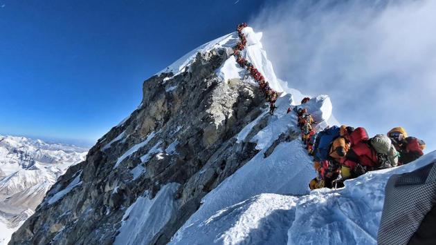 Image released by climber Nirmal Purja’s Project Possible expedition shows heavy traffic of mountain climbers lining up to stand at the summit of Mount Everest. Many teams had to line up for hours on May 22 to reach the summit, risking frostbites and altitude sickness, as a rush of climbers marked one of the busiest days on the world’s highest mountain. (Project Possible / AFP)