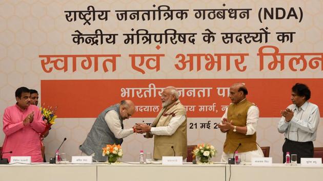 (L-R) Union Minister for Transport and Shipping Nitin Gadkari, BJP National president Amit Shah, Prime minister Narendra Modi, Union Home Minister Rajnath Singh and Union Commerce Minister Suresh Prabhu during a meeting of the Union Council of Ministers to thank them for their service during this term at BJP Headquarters in New Delhi. (Sonu Mehta / HT Photo) (L-R) Union Minister for Transport and Shipping Nitin Gadkari, BJP National president Amit Shah, Prime minister Narendra Modi, Union Home Minister Rajnath Singh and Union Commerce Minister Suresh Prabhu during a meeting of the Union Council of Ministers to thank them for their service during this term at BJP Headquarters in New Delhi. (Sonu Mehta / HT Photo)