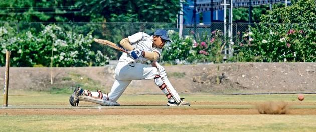 Tanmay Sanghavi of Aryan Cricket Academy in action during the match against HK Bounce Academy in the u-19 inter-club tournament at Kodre Farms in Dhayari on Saturday.(RAVINDRA JOSHI/HT PHOTO)