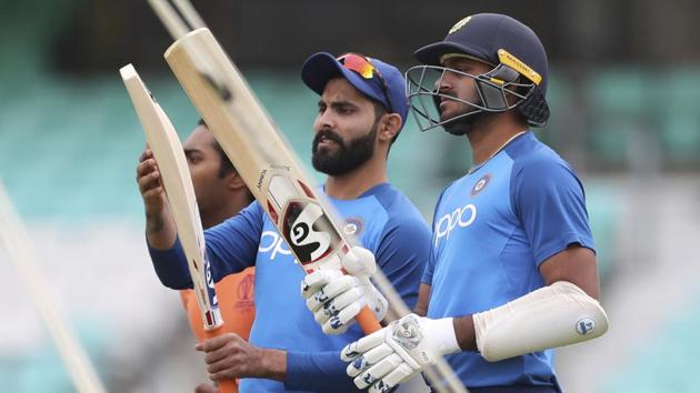 India's Vijay Shankar, right, and Ravindra Jadeja check out the bats during a training session at The Oval in London, Friday, May 24, 2019. The Cricket World Cup starts on Thursday May 30.(AP)