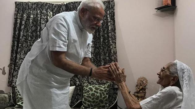 Prime Minister Narendra Modi visited his mother in Gandhinagar on Sunday.(ANI PHOTO) Prime Minister Narendra Modi visited his mother in Gandhinagar on Sunday.(ANI PHOTO)