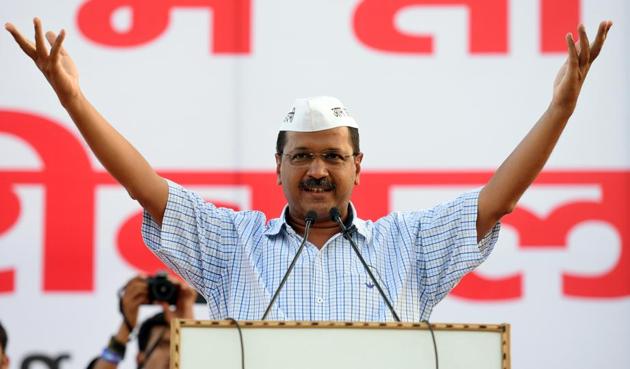 Delhi Chief Minister Arvind Kejriwal addresses the crowd during a public meeting of AAP workers at Punjabi Bagh Club in New Delhi on Sunday.(Amal KS/HT PHOTO)