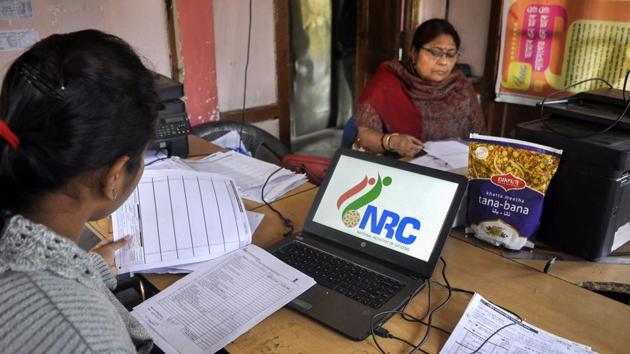 Data entry operators of National Register of Citizens (NRC) carry out correction of names and spellings at an NRC Seva Kendra at Birubari in Guwahati .(PTI FILE PHOTO)
