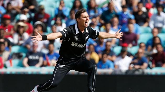 New Zealand's Trent Boult celebrates taking the wicket of India's Rohit Sharma(AFP)