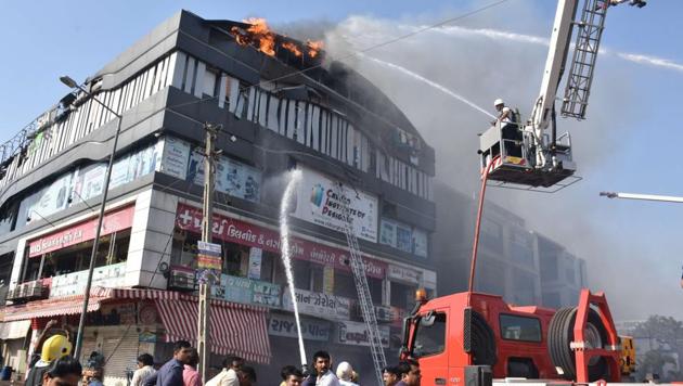The chief secretary said in the past two days, 9,395 buildings all over Gujarat had been given show cause notices after a preliminary inspection, after the Surat fire incident.(HT PHOTO)