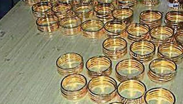 The fake gold bangles that DRI seized at Ahmedabad Air Cargo on Saturday. (HT photo) The fake gold bangles that DRI seized at Ahmedabad Air Cargo on Saturday. (HT photo)