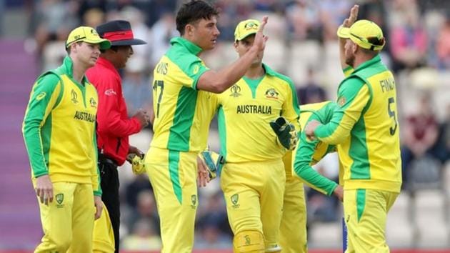 Australia's Marcus Stoinis celebrates running out England's Chris Woakes.(Action Images via Reuters)